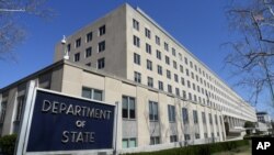 File - The Harry S. Truman Building, headquarters for the State Department, is seen in Washington, in this March 9, 2009