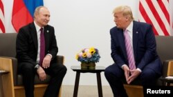 Президент США Дональд Трамп и президент России Владимир Путин (архивное фото)