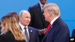 Дональд Трамп и Владимир Путин в кулуарах саммита G-20 в Буэнос-Айресе, Аргентина, 30 ноября 2018 года