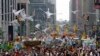 Demonstrators make their way down Sixth Avenue in New York during the People's Climate March, Sept. 21, 2014. 