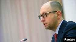 FILE - Ukrainian Prime Minister Arseniy Yatsenyuk